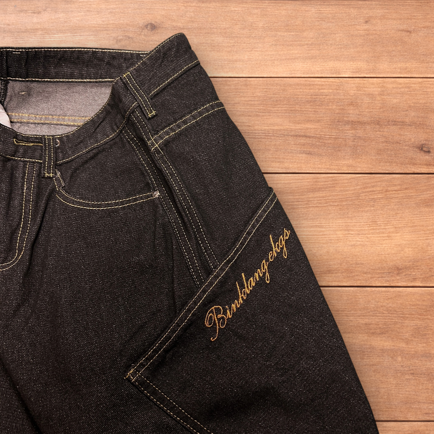 Incredible vintage style baggy wide leg skater fit jeans with embroidery in mid black.