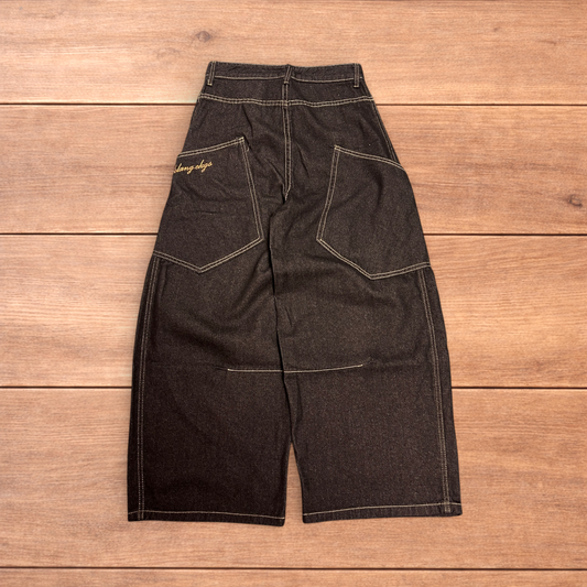 Incredible vintage style baggy wide leg skater fit jeans with embroidery in mid black.
