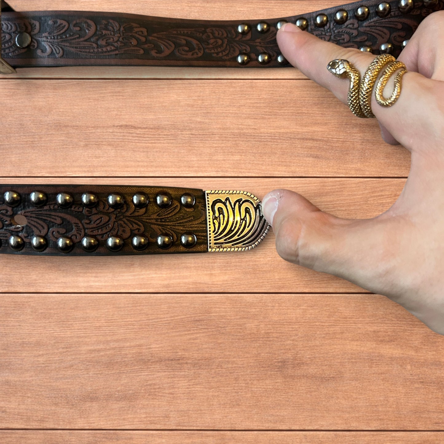 Vintage style faux leather western cowboy gothic belt in brown with silver trim.
