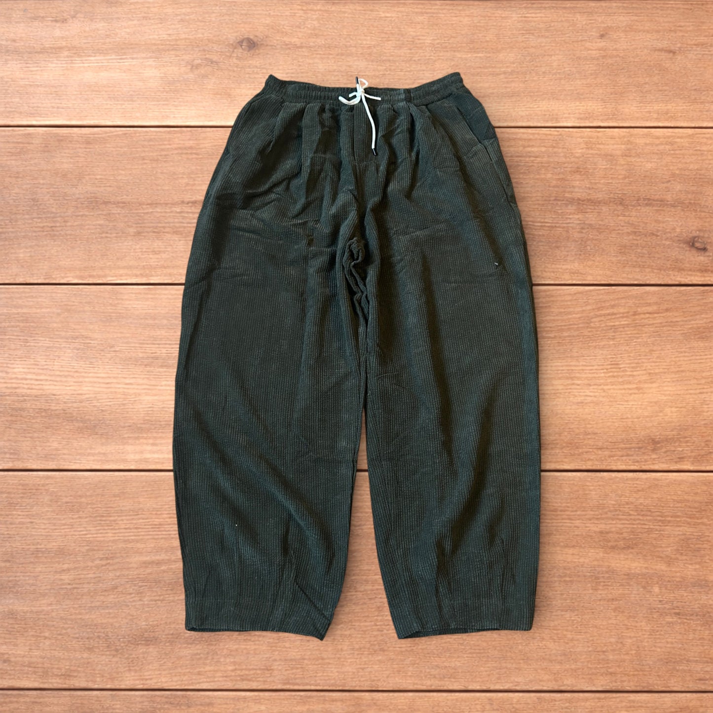 Super baggy wide leg skater corduroy trousers in khaki green.