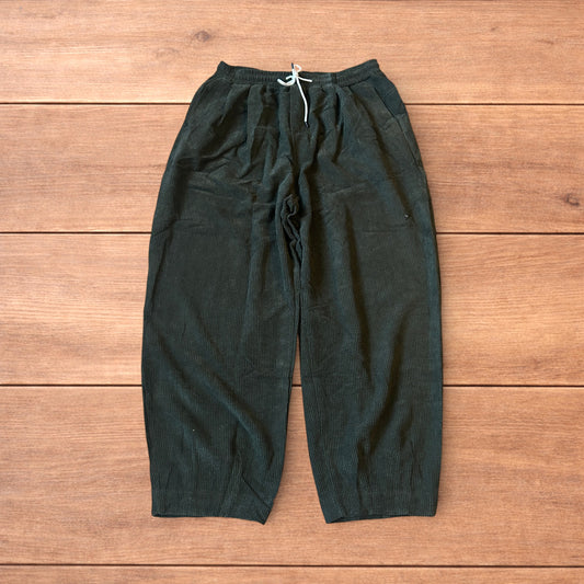 Super baggy wide leg skater corduroy trousers in khaki green.