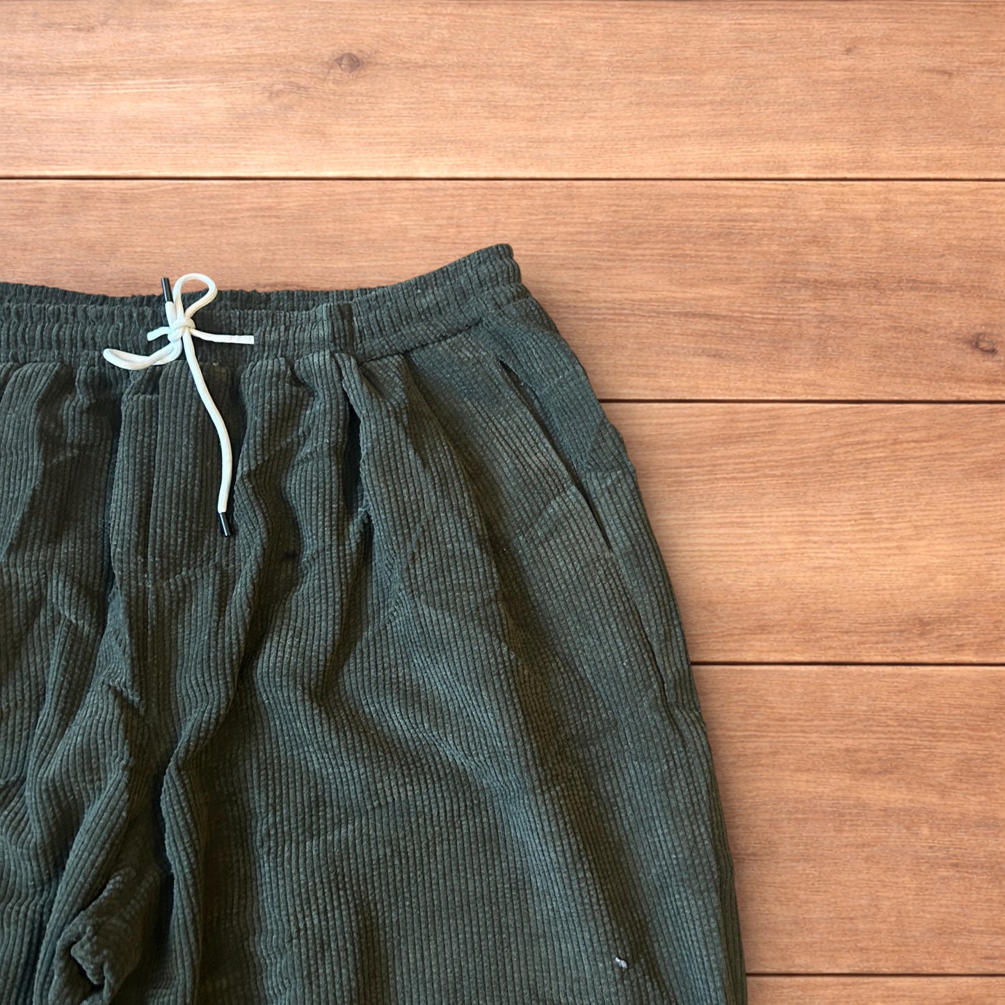 Super baggy wide leg skater corduroy trousers in khaki green.