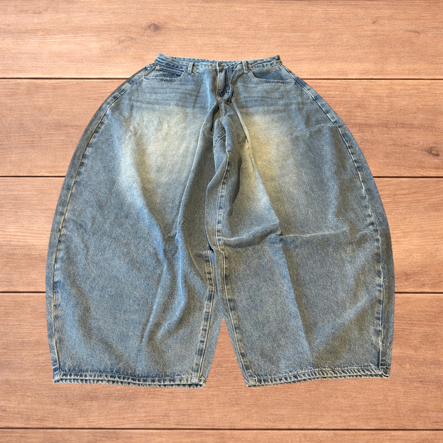 Super baggy wide leg balloon fit jeans in mid blue wash.