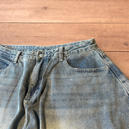 Super baggy wide leg balloon fit jeans in mid blue wash.