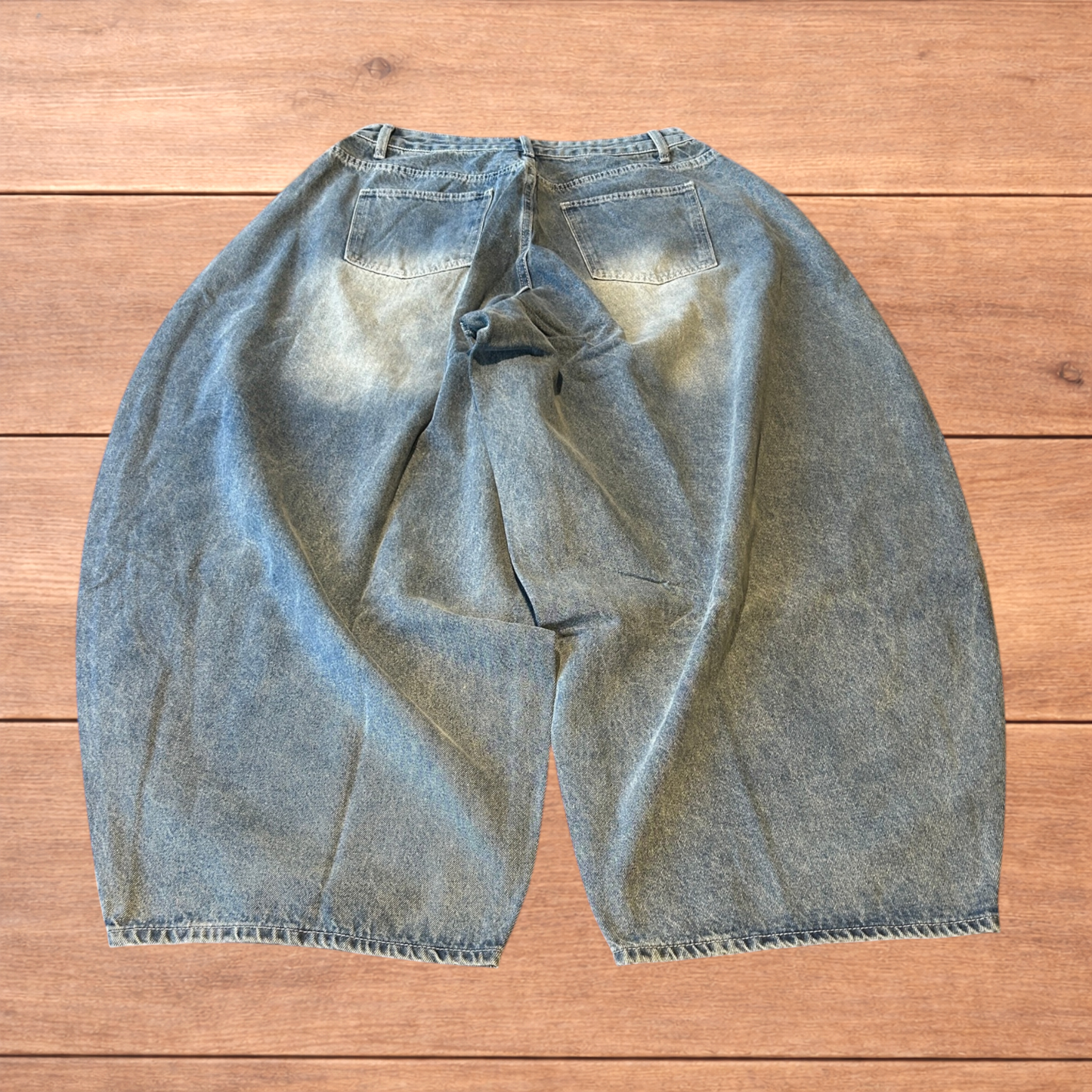 Super baggy wide leg balloon fit jeans in mid blue wash.