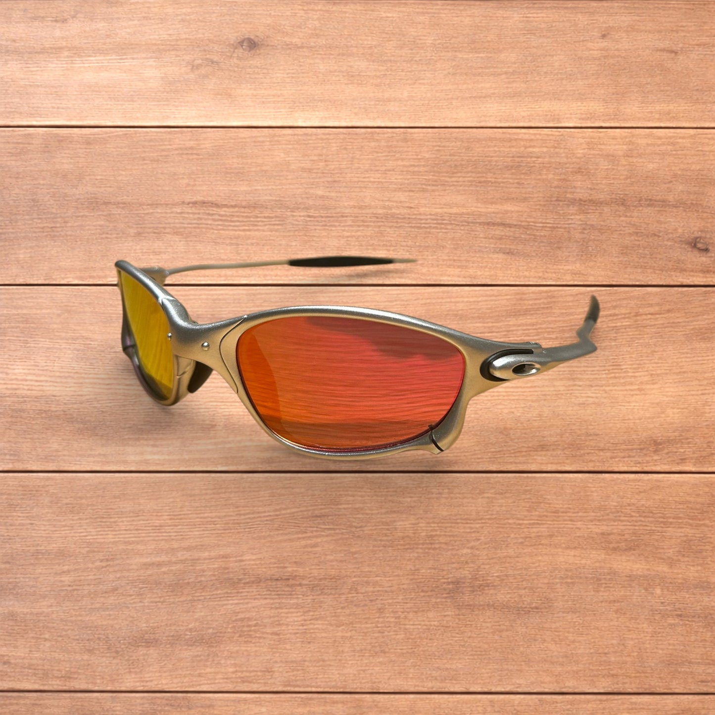 Insane metal frame sunglasses in silver with orange lense.