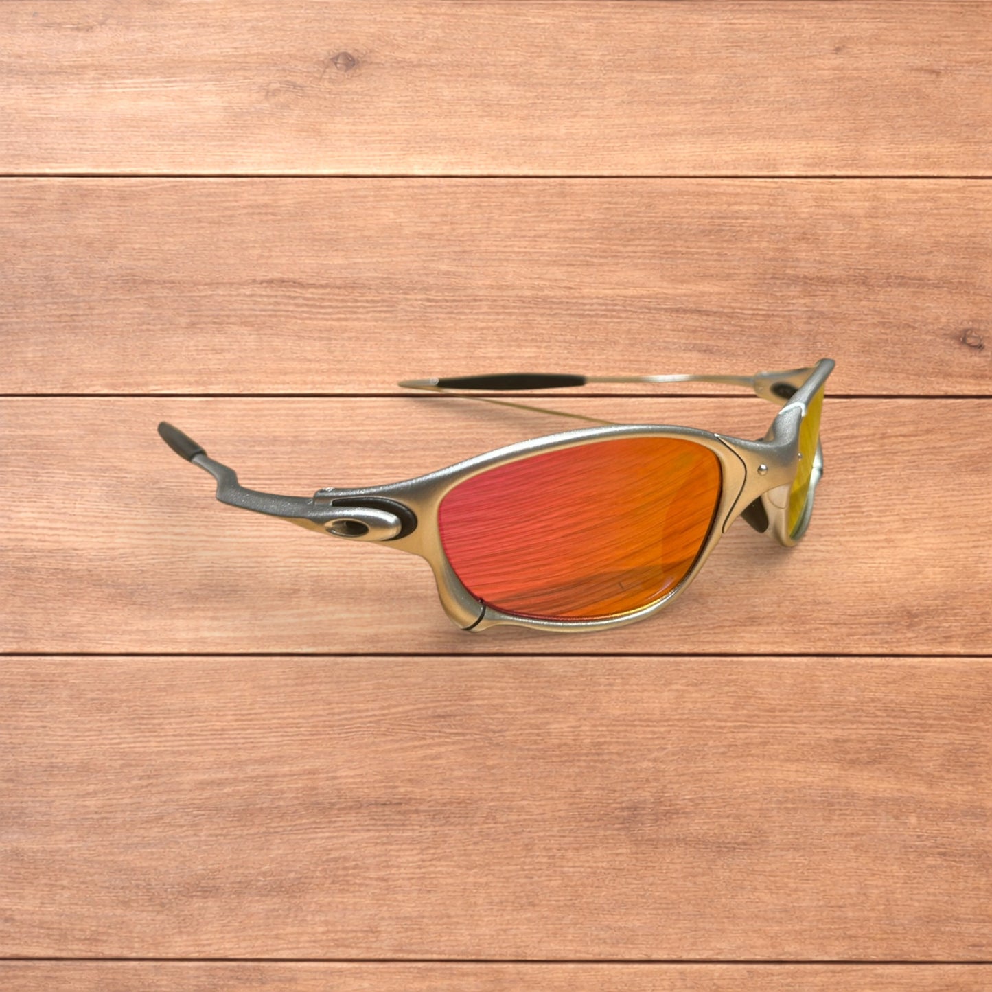 Insane metal frame sunglasses in silver with orange lense.