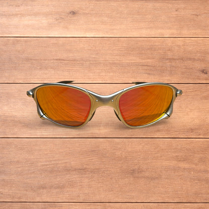 Insane metal frame sunglasses in silver with orange lense.