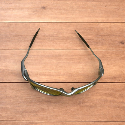 Insane metal frame sunglasses in silver with orange lense.