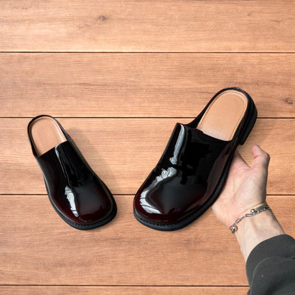 Lovely faux leather slip on clogs slippers in oxblood red.