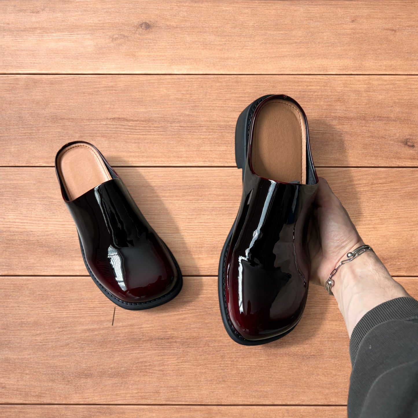 Lovely faux leather slip on clogs slippers in oxblood red.