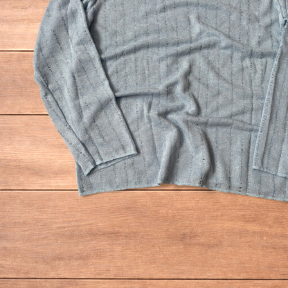 Surfer style baggy long sleeve knit top shirt in light blue.