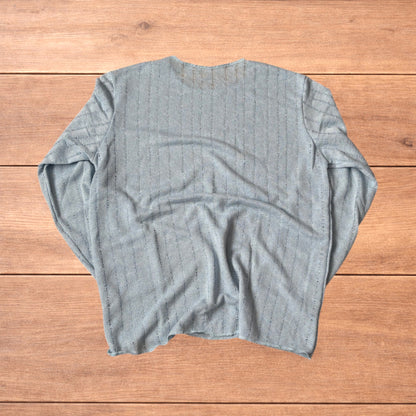 Surfer style baggy long sleeve knit top shirt in light blue.