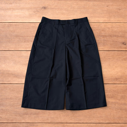 Vintage style baggy wide leg long tailored shorts in black.