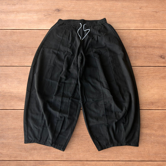 Incredible super baggy wide leg parachute trousers in black.