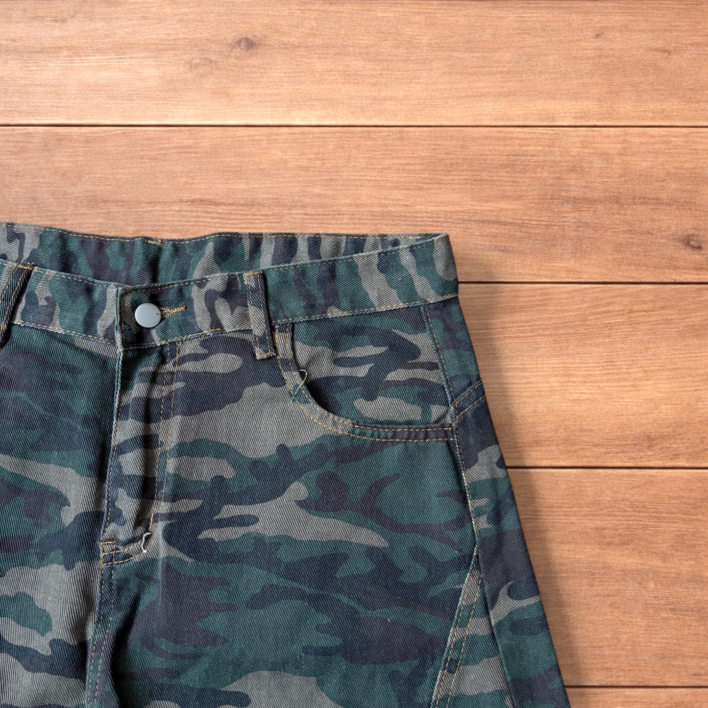 Super baggy wide leg cargo carpenter trousers in army camo.