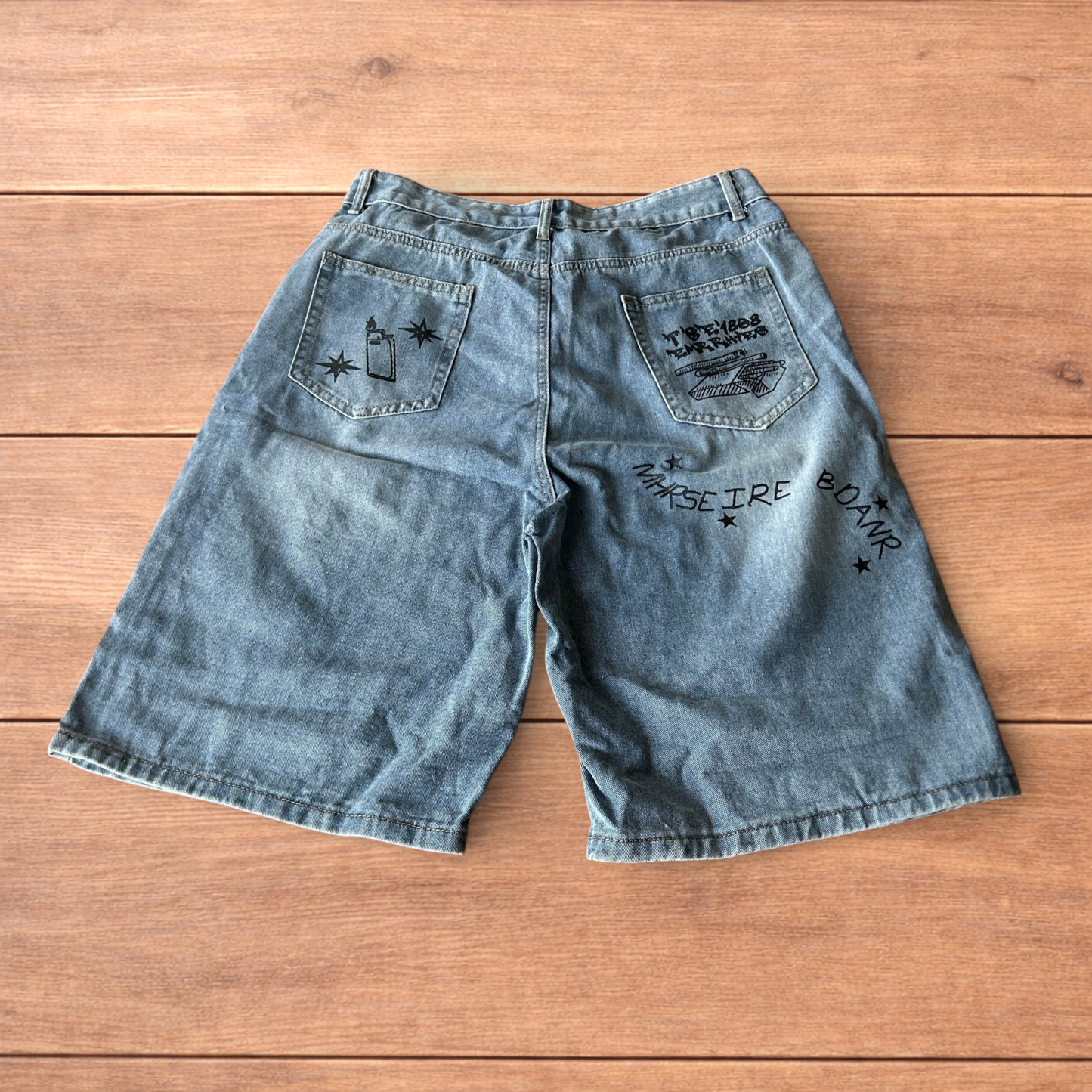 Incredible baggy wide leg denim shorts jorts with graffiti/graphic in light blue.