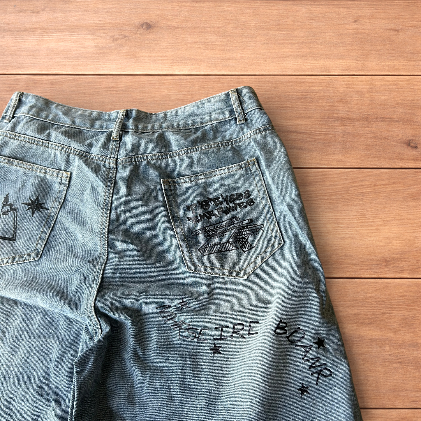 Incredible baggy wide leg denim shorts jorts with graffiti/graphic in light blue.