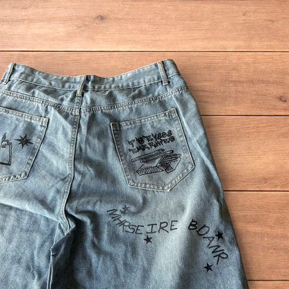 Incredible baggy wide leg denim shorts jorts with graffiti/graphic in light blue.