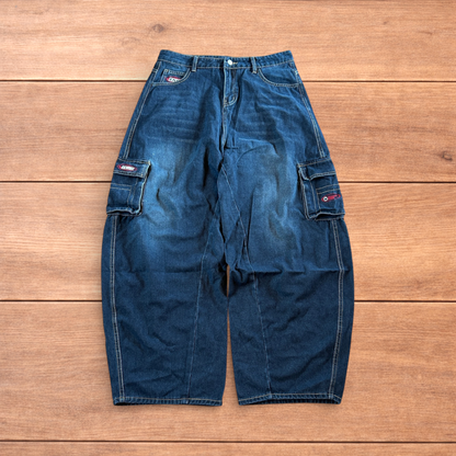 Vintage style baggy wide leg skater fit cargo jeans with embroidery in mid blue.