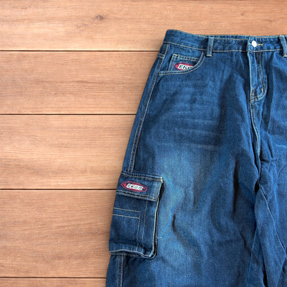 Vintage style baggy wide leg skater fit cargo jeans with embroidery in mid blue.