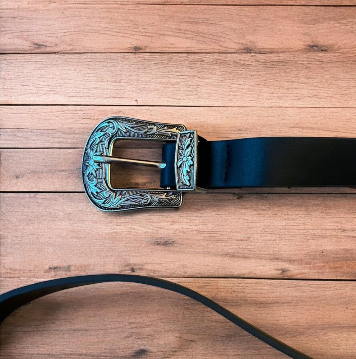 Vintage style faux leather western cowboy belt in black with silver trim. 100cm.