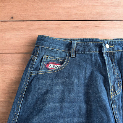 Incredible vintage style baggy wide leg skater fit cargo jeans with embroidery in mid blue.