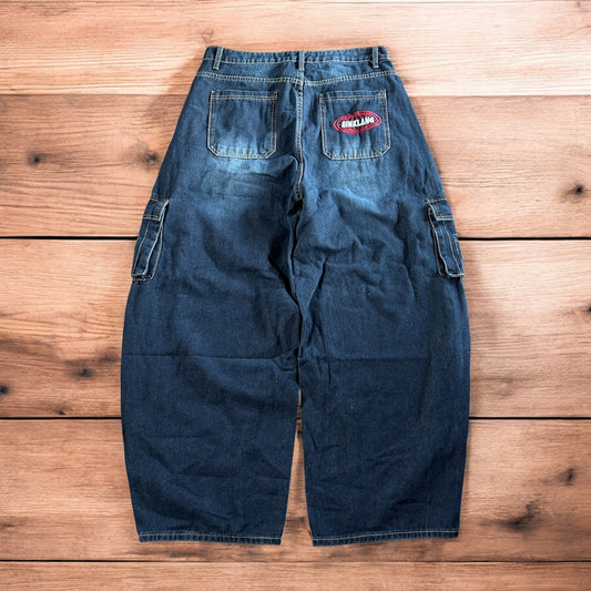 Incredible vintage style baggy wide leg skater fit cargo jeans with embroidery in mid blue.