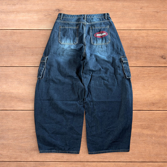 Vintage style baggy wide leg skater fit cargo jeans with embroidery in mid blue.