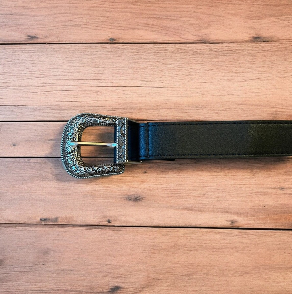 Vintage style faux leather western cowboy belt in black with silver trim. 105cm.