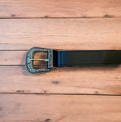 Vintage style faux leather western cowboy belt in black with silver trim. 105cm.