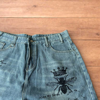 Incredible baggy wide leg denim shorts jorts with graffiti/graphic in light blue.