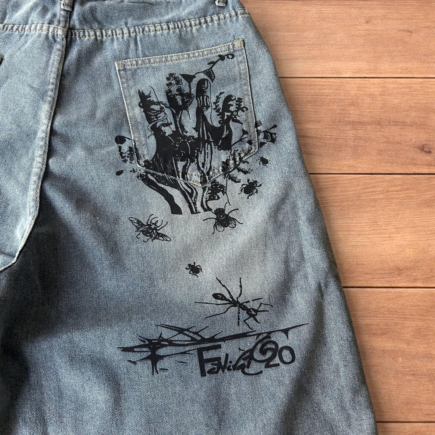 Incredible baggy wide leg denim shorts jorts with graffiti/graphic in light blue.