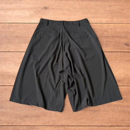Super baggy wide leg tailored 3/4 shorts jorts in khaki/brown.