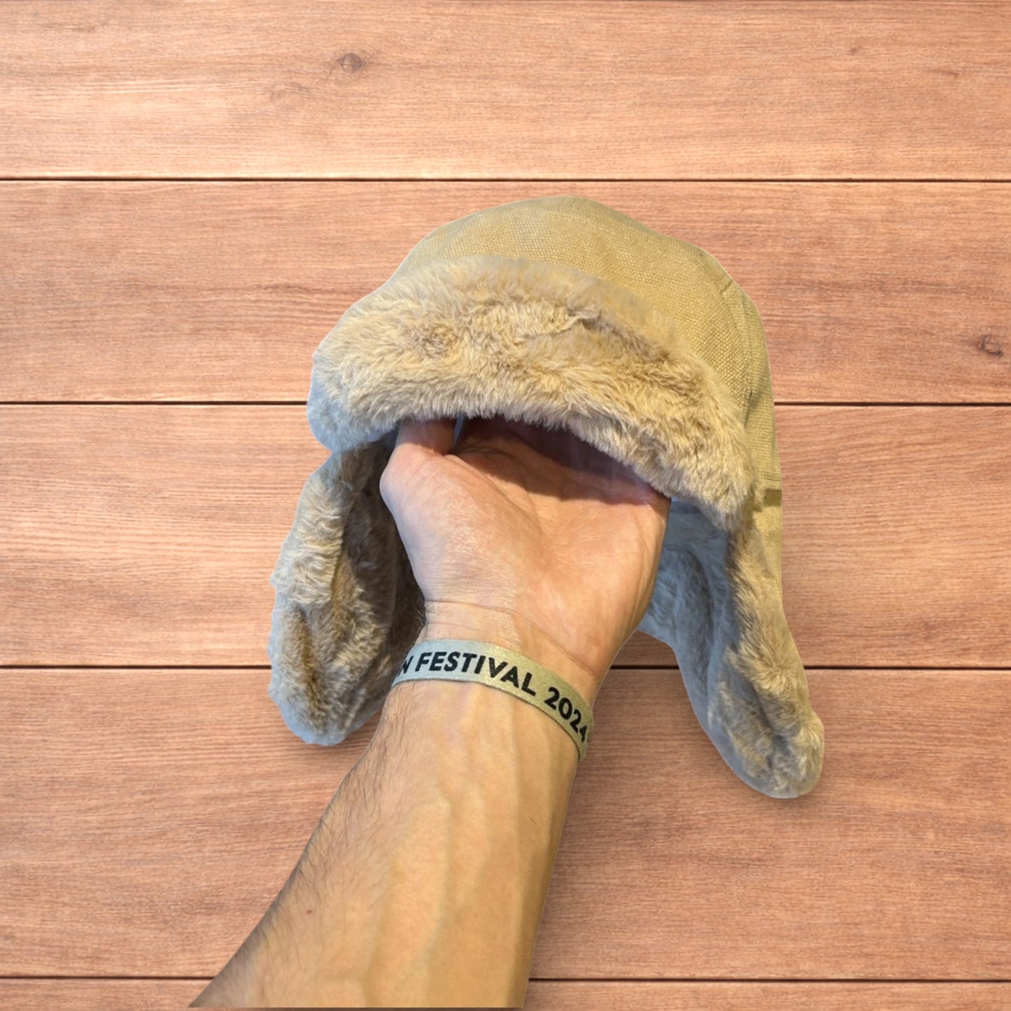 Russian ushanka trapper ear flap winter hat in cream/beige colour way.