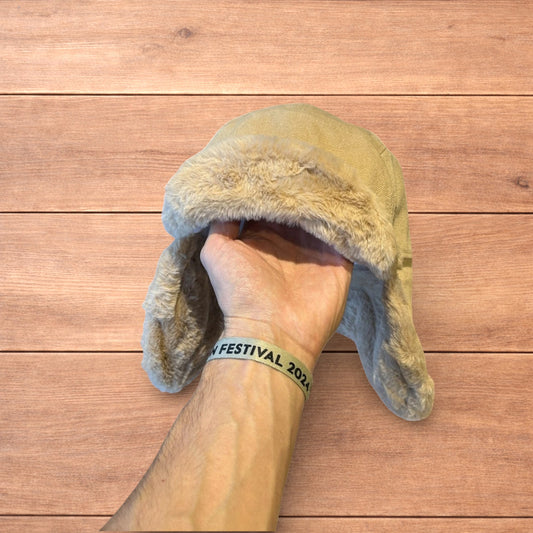 Russian ushanka trapper ear flap winter hat in cream/beige colour way.