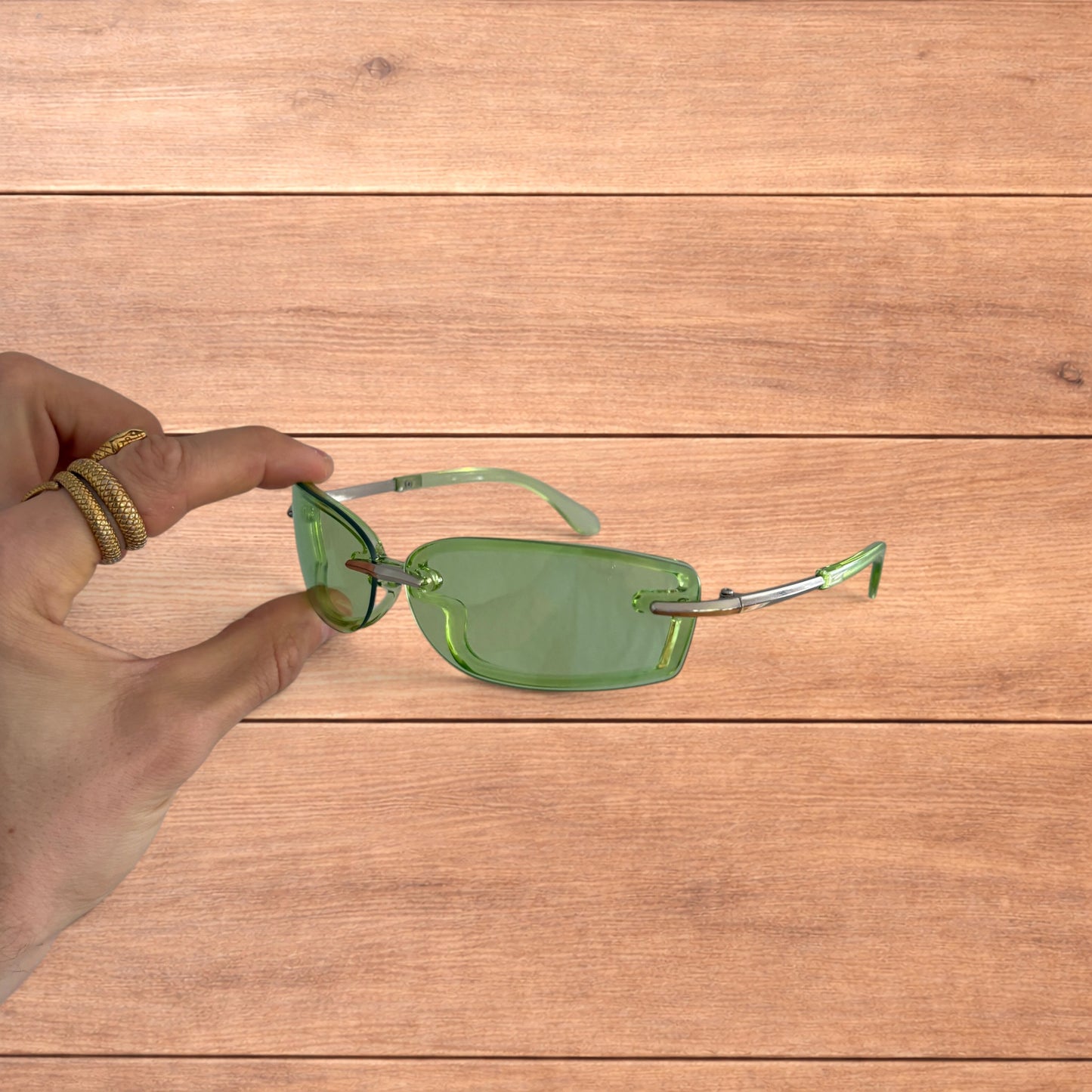 Lovely rimless rectangle frame sunglasses in green and silver.