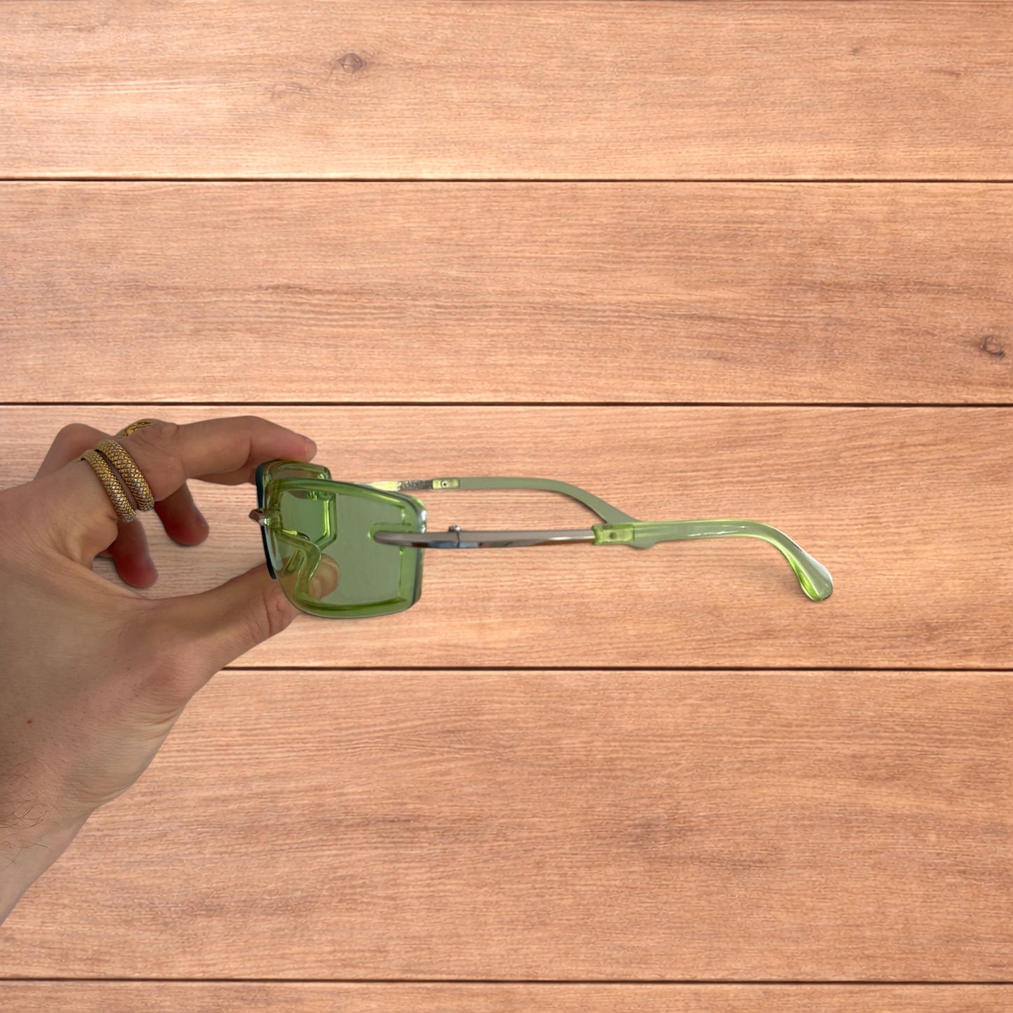 Lovely rimless rectangle frame sunglasses in green and silver.