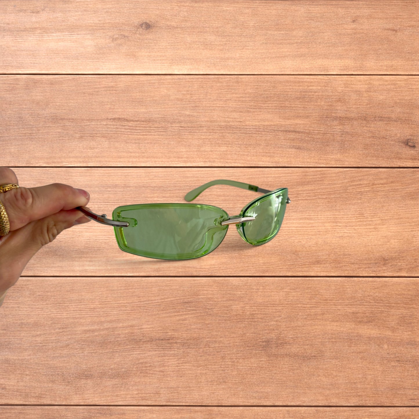 Lovely rimless rectangle frame sunglasses in green and silver.