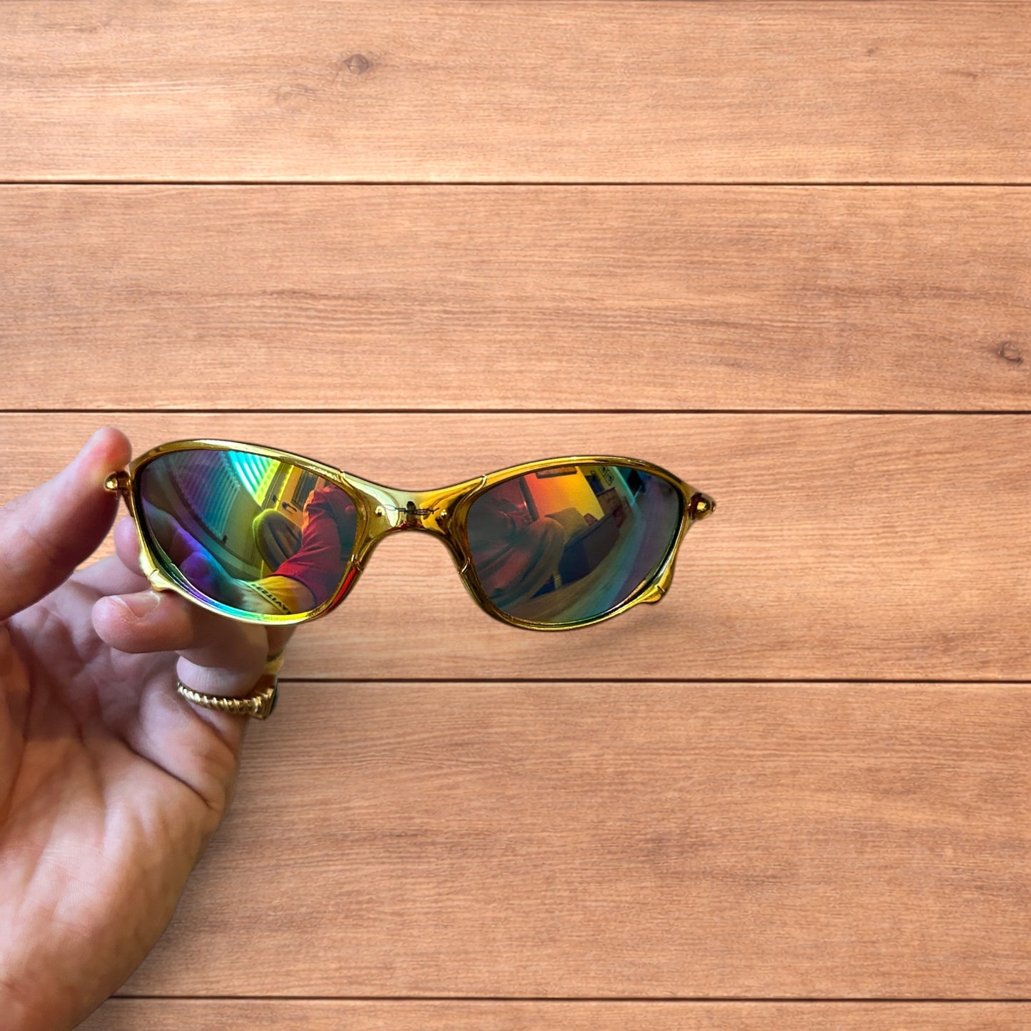 Insane metal frame sunglasses in gold with multicolour rainbow lense.