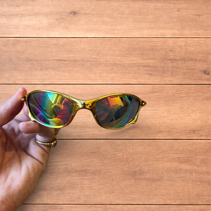 Insane metal frame sunglasses in gold with multicolour rainbow lense.