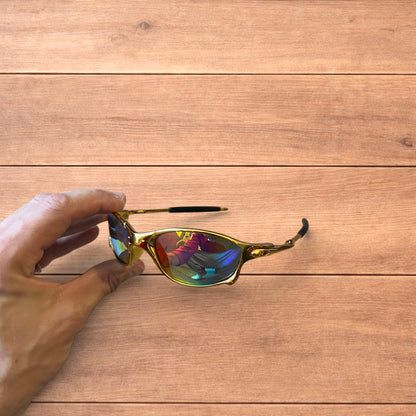 Insane metal frame sunglasses in gold with multicolour rainbow lense.