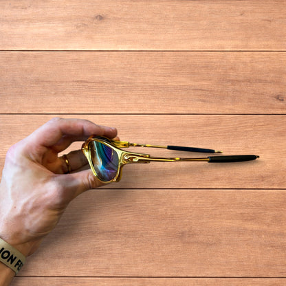 Insane metal frame sunglasses in gold with multicolour rainbow lense.