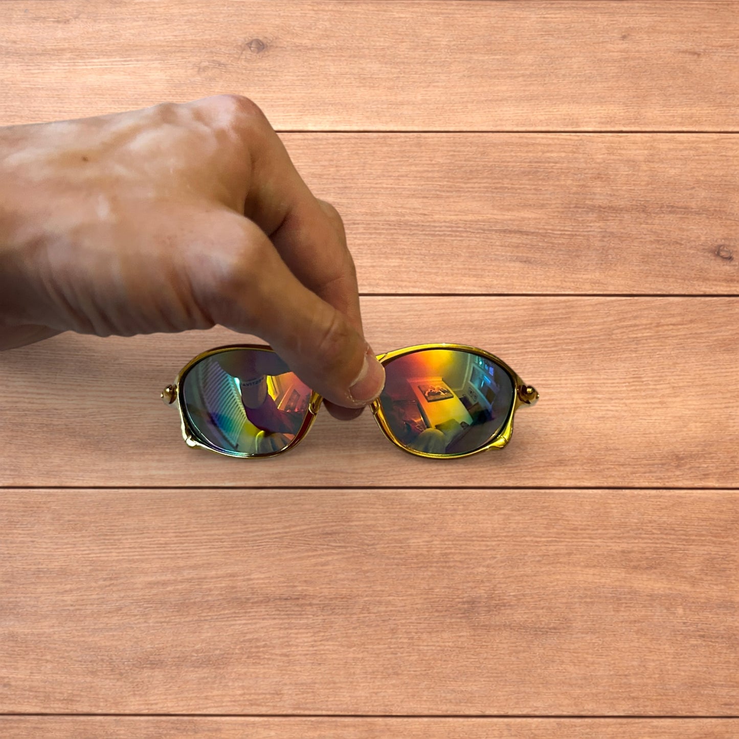 Insane metal frame sunglasses in gold with multicolour rainbow lense.