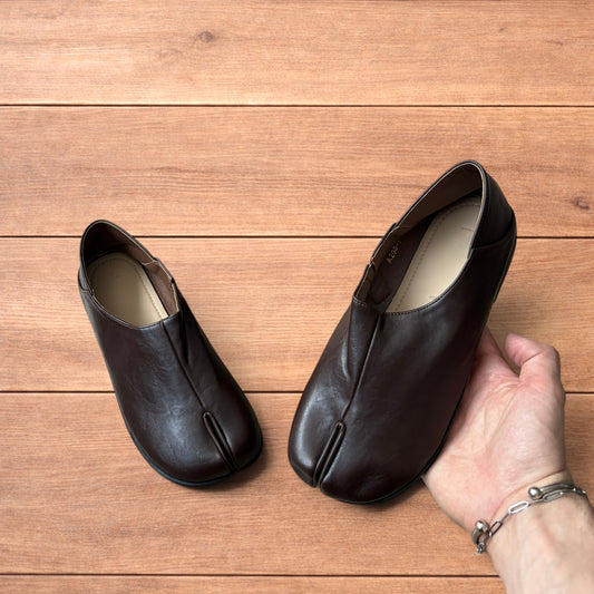 Vintage style faux leather tabi split toe shoes in brown.