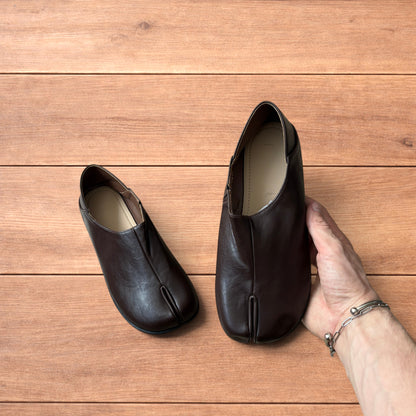 Vintage style faux leather tabi split toe shoes in brown.