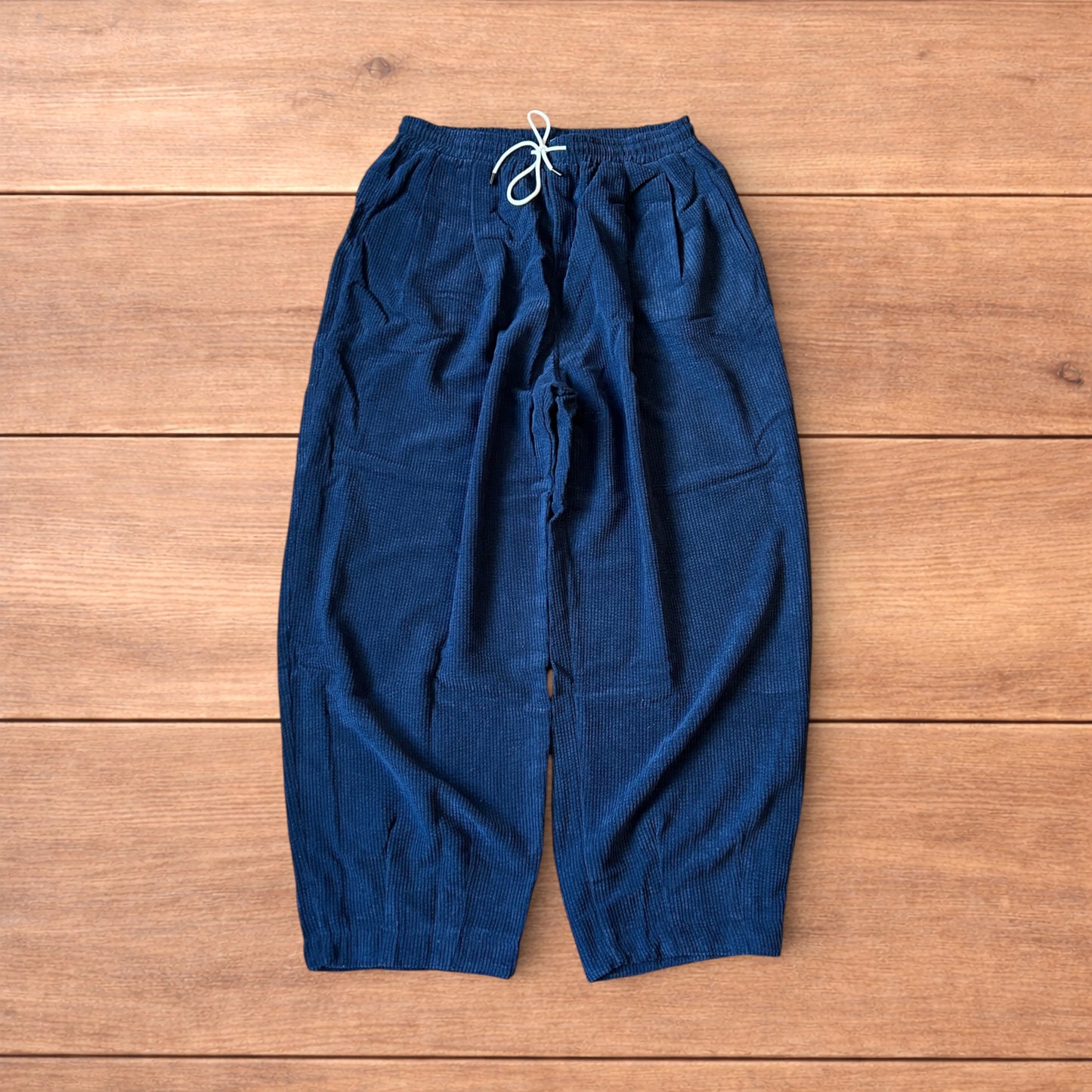 Super baggy wide leg skater corduroy trousers in navy blue.