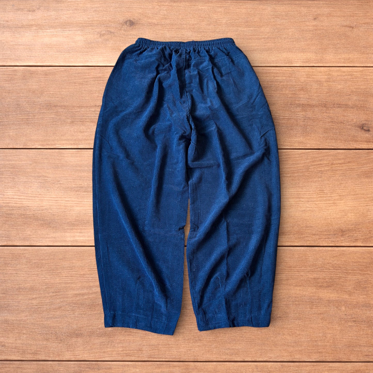 Super baggy wide leg skater corduroy trousers in navy blue.