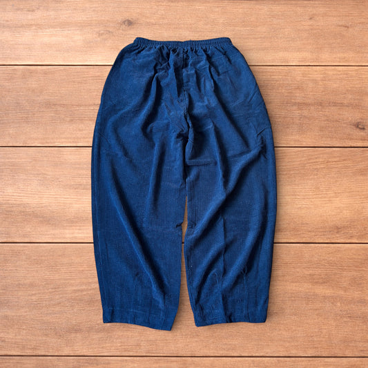 Super baggy wide leg skater corduroy trousers in navy blue.