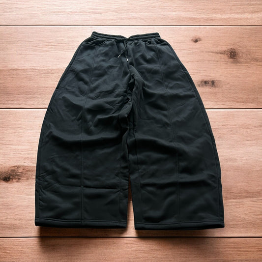 Super baggy wide leg Korean joggers in black.